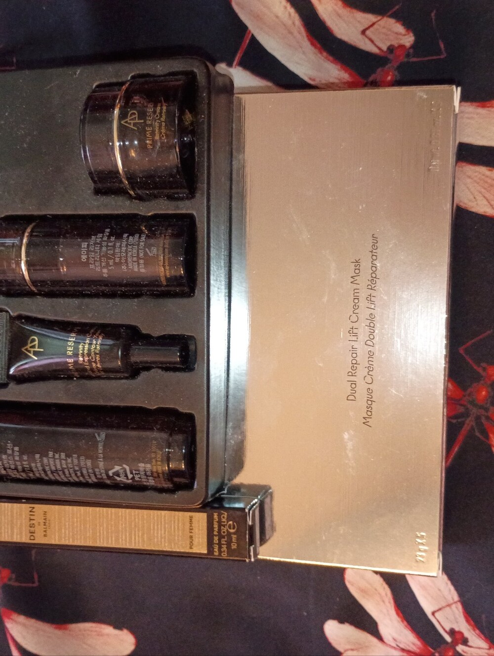 Amore Pacific black and gold skincare set